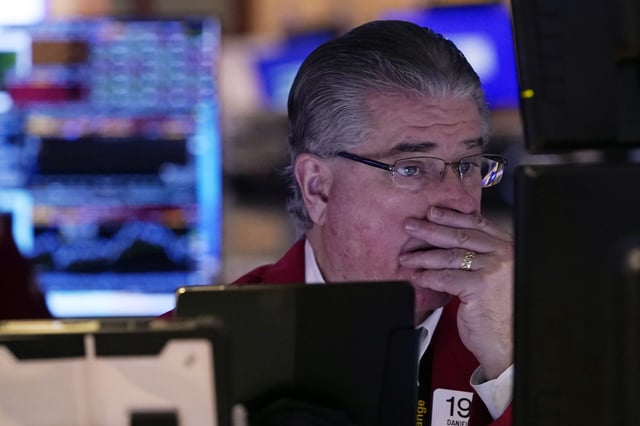 Trader Daniel Kryger works on the floor of the New York Stock Exchange, Tuesday, Feb. 4, 2025. (AP Photo/Richard Drew)