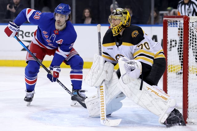 Feb 5, 2025; New York, New York, USA; Boston Bruins goaltender Joonas Korpisalo (70) tends net against New York Rangers left wing Chris Kreider (20) during the second period at Madison Square Garden. Mandatory Credit: Brad Penner-Imagn Images