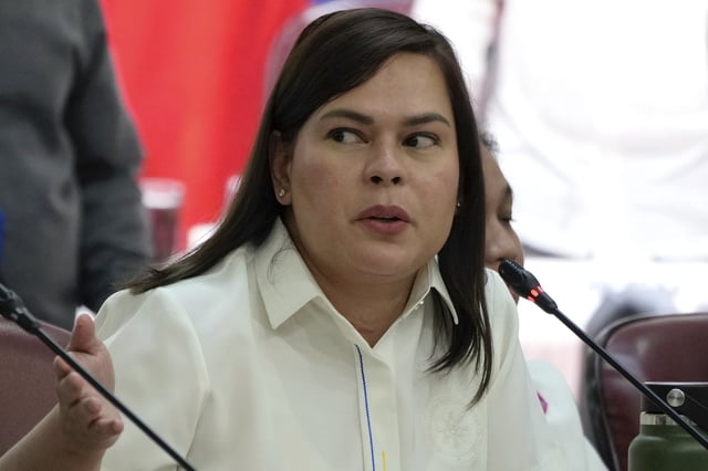 FILE -Philippine Vice President Sara Duterte gestures as she attends a hearing at the House of Representative in Quezon City, Philippines, Nov. 25, 2024.(AP Photo/Aaron Favila), File)