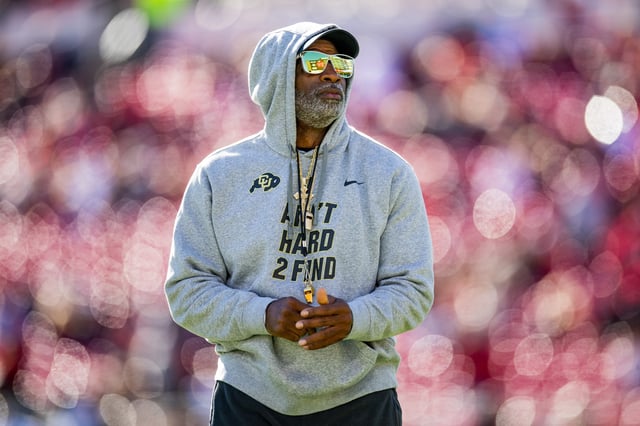 Head coach Deion Sanders of the Colorado Buffaloes walks across the field before the game against the Texas Tech Red Raiders at Jones AT&amp;T Stadium on November 09, 2024 in Lubbock, Texas.