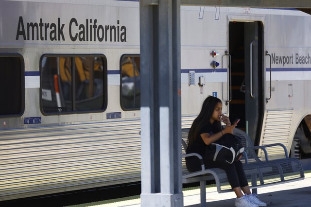 An Amtrak Pacific Surfliner train stops at the Moorpark Train Station on June 15, 2024 in Moorpark, California.