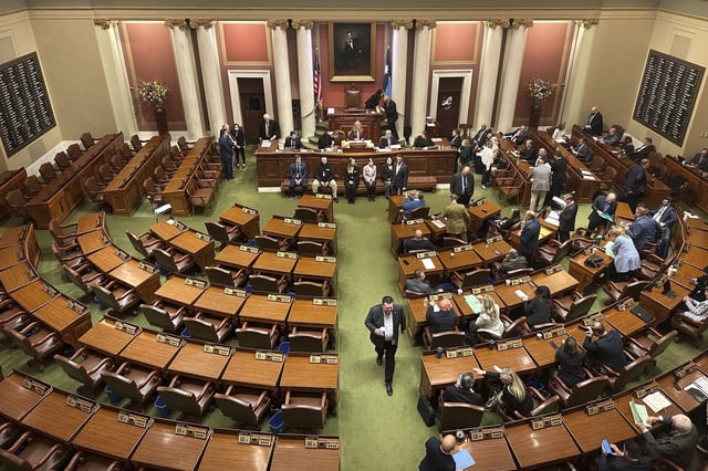 The Democratic side of the Minnesota House chamber was empty for a second straight day Wednesday, Jan. 15, 2025, in St. Paul, Minn., as Democrats continued their boycott in a power struggle with Republicans. (AP Photo/Steve Karnowski)