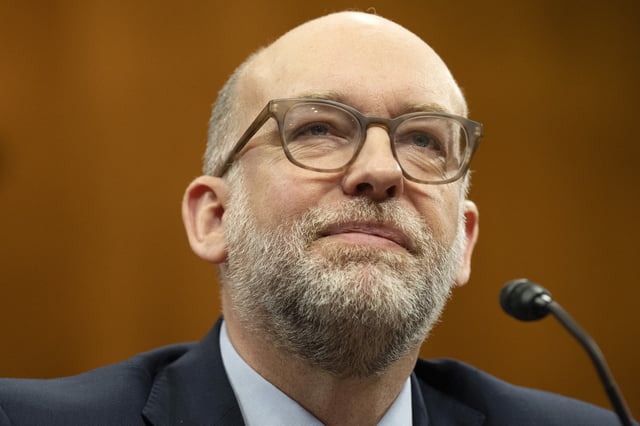 Russell Vought, President Donald Trump's choice for Director of the Office of Management and Budget, attends a Senate Budget Committee hearing on his nomination, on Capitol Hill in Washington, Wednesday, Jan. 22, 2025. (AP Photo/Jacquelyn Martin)