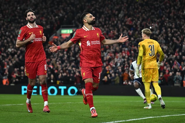 Soccer Football - Carabao Cup - Semi Final - Second Leg - Liverpool v Tottenham Hotspur - Anfield, Liverpool, Britain - February 6, 2025 Liverpool's Mohamed Salah celebrates scoring their second goal REUTERS/Dylan Martinez