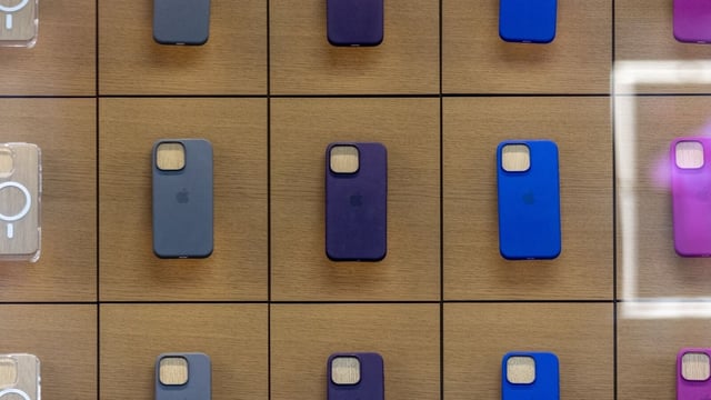 Protective cases for iPhone handsets on display in an Apple Inc. store in central London, UK. The new iPhone SE is due in coming days