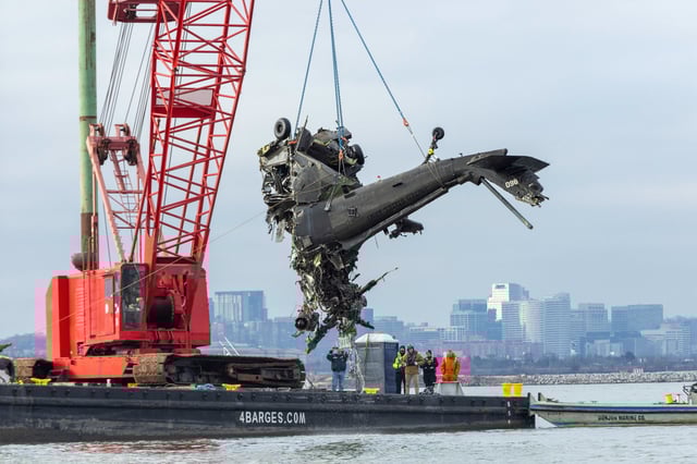 Authorities with the NTSB, in coordination with SUPSALV, recover the Sikorsky UH-60 Black Hawk, along the Potomac River, in Arlington, Va., on Feb. 6, 2025.