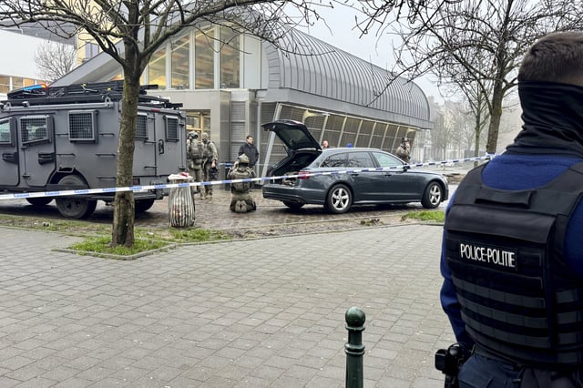 Police work in an area around the Clemenceau metro station after a shooting incident in Brussels, Wednesday, Feb. 5, 2025. (AP Photo/Sylvain Plazy)