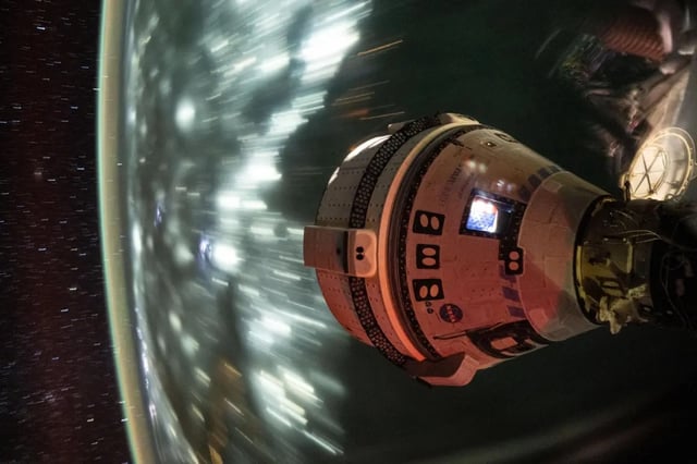 Boeing’s Starliner spacecraft is pictured docked to the International Space Station&#39;s Harmony module forward port. This long-duration photograph was taken at night 256 miles above the Arabian Sea off the coast of Mumbai, India. (NASA)