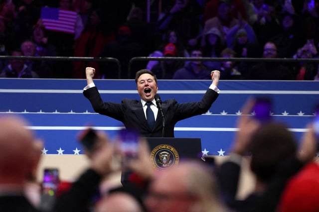 Tesla CEO and X owner Elon Musk gestures on stage as he prepares to speak inside the Capital One arena on the inauguration day of Donald Trump's second Presidential term, in Washington, U.S., January 20, 2025. 
