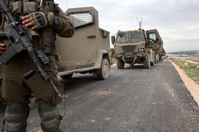 In this January 22 photo, Israeli troops and military vehicles prepare to enter Jenin in the occupied West Bank.