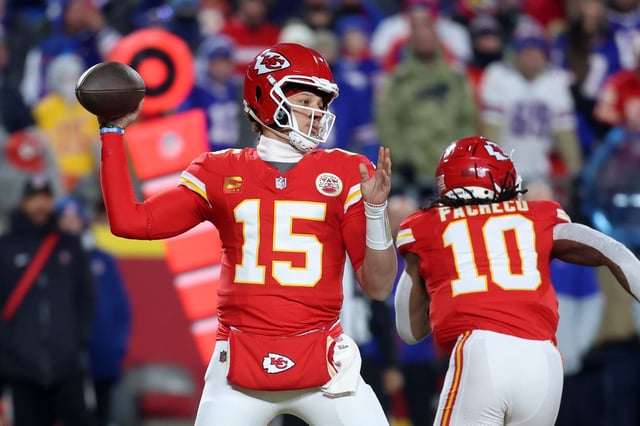 Some workers are taking a pass on going to work the day after the Kansas City Chiefs and quarterback Patrick Mahomes (15) play the Philadelphia Eagles.