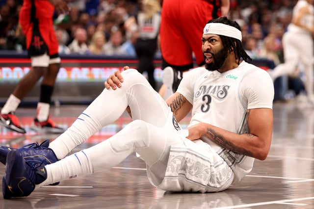 Anthony Davis #3 of the Dallas Mavericks reacts after an injury in the game against the Houston Rockets at American Airlines Center on February 08, 2025 in Dallas, Texas. NOTE TO USER: User expressly acknowledges and agrees that, by downloading and or using this photograph, User is consenting to the terms and conditions of the Getty Images License Agreement.