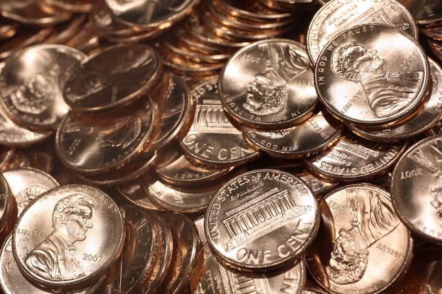 Recently struck pennies sit in a bin at the U.S. Mint in Philadelphia, Pennsylvania on Wednesday, Aug. 8, 2007.