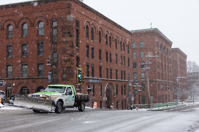 A snow plow on Adams Street during a snow storm on February 9, 2025 in Milton, Massachusetts.