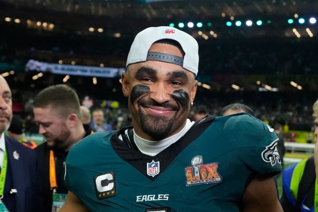 Philadelphia Eagles quarterback Jalen Hurts (1) celebrates after the NFL Super Bowl 59 football game against the Kansas City Chiefs, Sunday, Feb. 9, 2025, in New Orleans. (AP Photo/Brynn Anderson)