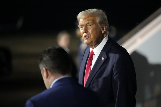 President Donald Trump is pictured before boarding Air Force One at the Naval Air Station Joint Reserve Base in New Orleans, Sunday, Feb. 9, 2025. (AP Photo/Ben Curtis)