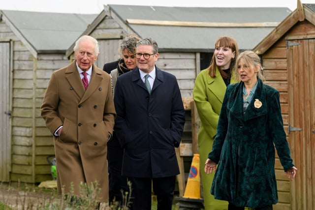Britain's King Charles III (L), Prime Minister Keir Starmer (C) and Deputy Prime Minister Angela Rayner (2nd R) visited a new housing development outside the seaside town of Newquay in southwest England