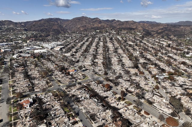 The devastation from the Palisades Fire is shown in an aerial view in the Pacific Palisades neighborhood of Los Angeles, Monday, Jan. 27, 2025.