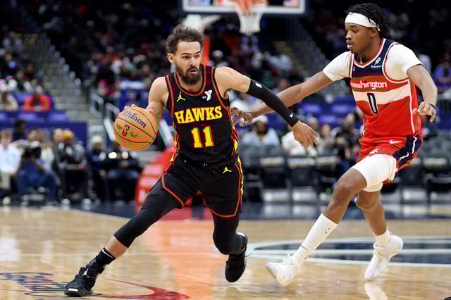 Feb 8, 2025; Washington, District of Columbia, USA; Atlanta Hawks guard Trae Young (11) drives past Washington Wizards guard Bilal Coulibaly (0) during the first half at Capital One Arena. Mandatory Credit: Daniel Kucin Jr.-Imagn Images/File Photo