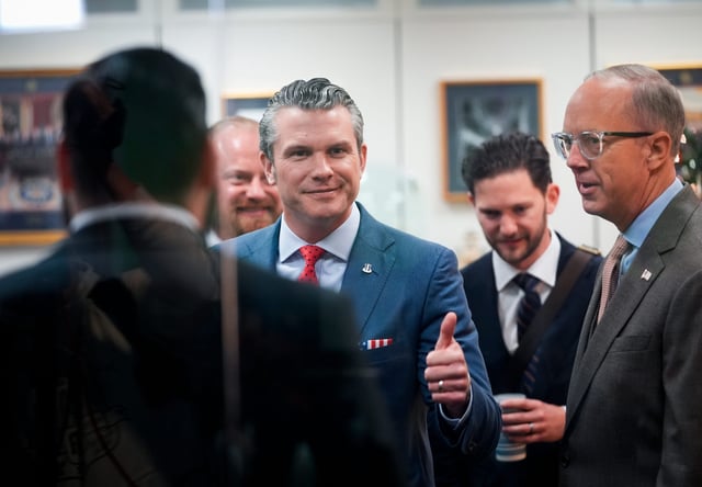 Pete Hegseth, President-elect Donald Trump's nominee for secretary of defense, arrives with his wife Jennifer Ratchet, for a meeting with Senator Rick Scott (R-FL) in the Hart Senate Office Building on Thursday, Dec. 5, 2024.