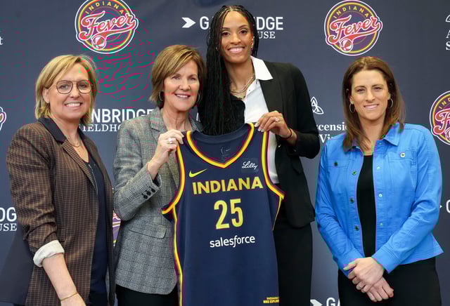 From left, Indiana Fever GM Amber Cox, President of Basketball Operations Kelly Krauskopf, forward DeWanna Bonner and head coach Stephanie White at Bonner's introductory press conference on Monday.