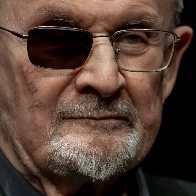 FILE - Author Salman Rushdie poses for a portrait to promote his book "Knife: Meditations After an Attempted Murder", at the Deutsches Theater in Berlin, Germany, May 16, 2024. (AP Photo/Ebrahim Noroozi, File)