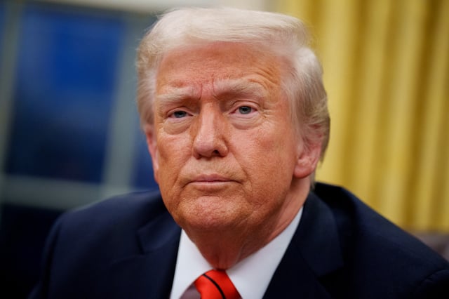 U.S. President Donald Trump takes a question from a reporter after signing a series of executive orders including 25% tariffs on steel and aluminum, a pardon for former Illinois Gov. Rod Blagojevich, an order relating to the Foreign Corrupt Practices Act, and an order for the federal government to stop using paper straws and begin using plastic straws in the Oval Office at the White House on February 10, 2025 in Washington, DC.