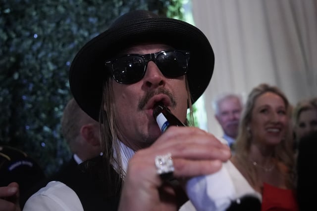 Kid Rock takes a drink at the Commander-in-Chief Ball on January 20, 2025 in Washington, DC.