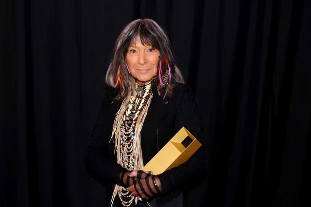 Buffy Sainte-Marie poses backstage at the 2022 Toronto International Film Festival at The Fairmont Royal York Hotel in Sept. 2022 in Toronto. The Oscar-winning folk singer-songwriter and activist has been stripped of her Order of Canada, the country’s highest civilian honor, following an investigation that cast doubt on her longstanding claims of Indigenous ancestry. 