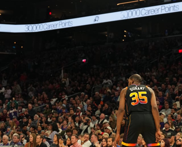 Feb 11, 2025; Phoenix, Arizona, USA; Phoenix Suns forward Kevin Durant (35) reacts after making a free throw during the second half against the Memphis Grizzlies to amass 30,000 career points at Footprint Center. Mandatory Credit: Joe Camporeale-Imagn Images