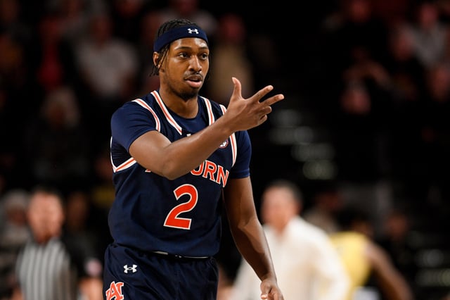 Feb 11, 2025; Nashville, Tennessee, USA;  Auburn Tigers guard Denver Jones (2) reacts after a made three-point basket against the Vanderbilt Commodores during the first half at Memorial Gymnasium. Mandatory Credit: Steve Roberts-Imagn Images