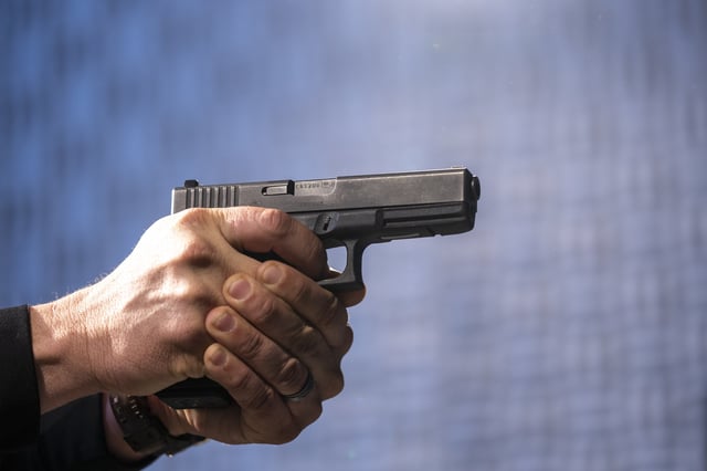 FILE p- A semi-automatic Glock pistol is fired at the Bureau of Alcohol, Tobacco, Firearms, and Explosives (ATF), National Services Center, March 2, 2023, in Martinsburg, W.Va. (AP Photo/Alex Brandon, File)