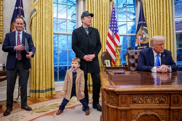 White House staff secretary Will Scharf, Tesla and SpaceX CEO Elon Musk, joined by his son X Musk, and U.S. President Donald Trump appear for an executive order signing in the Oval Office at the White House on February 11, 2025 in Washington, DC.