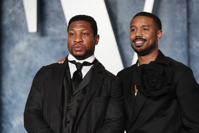 Jonathan Majors and Michael B. Jordan arrive at the Vanity Fair Oscar party after the 95th Academy Awards in 2023. Now, Jordan (right) is sharing his support for Majors in a new interview.