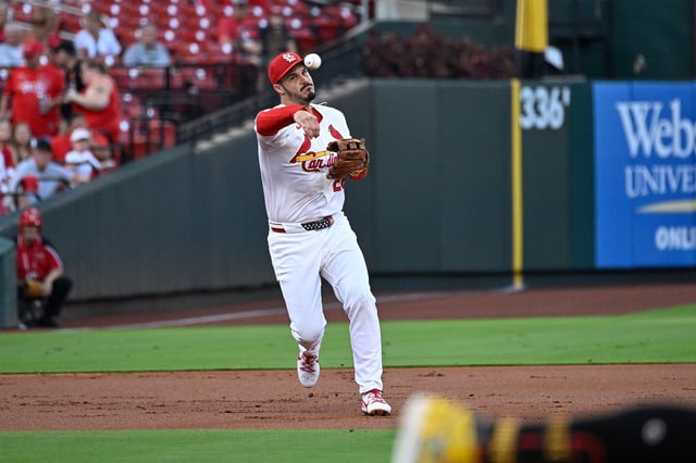 ST LOUIS, MISSOURI - SEPTEMBER 19: Nolan Arenado #28 of the St. Louis Cardinals throws to first base for an out against the Pittsburgh Pirates in the first inning at Busch Stadium on September 19, 2024 in St Louis, Missouri.