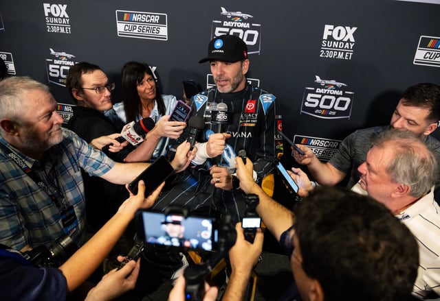 Feb 12, 2025; Daytona Beach, Florida, USA; NASCAR Cup Series driver Jimmie Johnson during Daytona 500 media day at Daytona International Speedway. Mandatory Credit: Mark J. Rebilas-Imagn Images
