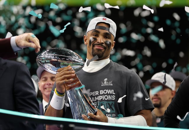 Jalen Hurts of the Philadelphia Eagles celebrates with the Vince Lombardi Trophy after his team won Super Bowl LIX at Caesars Superdome on February 09, 2025, in New Orleans, Louisiana.