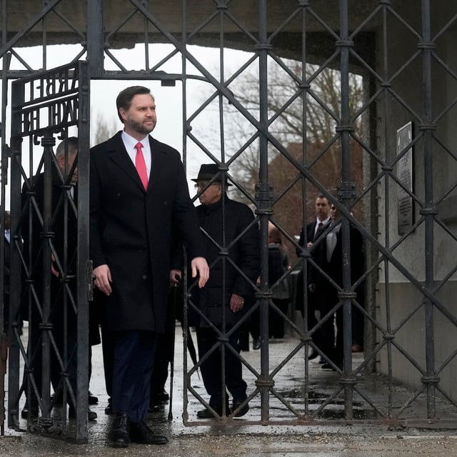 U.S. Vice President JD Vance enters the Dachau Concentration Camp Memorial Site outside Munich, Germany, Thursday, Feb. 13, 2025. (AP Photo/Matthias Schrader)