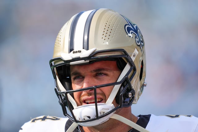 Derek Carr #4 of the New Orleans Saints looks on prior to the game against the Carolina Panthers at Bank of America Stadium on November 03, 2024 in Charlotte, North Carolina.