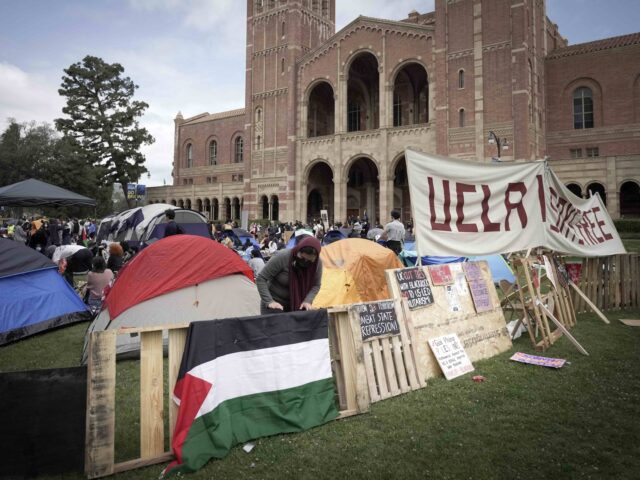 A makeshift camp supporting the Palestinians cause is staged on the UCLA campus, Thursday, April 25, 2024, in Los Angeles. (AP Photo/Jae C. Hong)