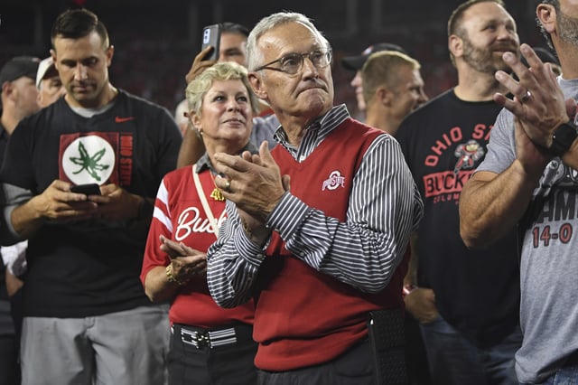 Former Ohio State head coach Jim Tressel watches a scoreboard tribute for the 2002 national championship team during the second quarter of an NCAA college football game between Notre Dame and Ohio State, Saturday, Sept. 3, 2022, in Columbus, Ohio. 