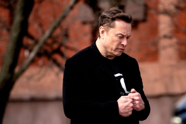 Elon Musk, chief executive officer of Tesla Inc., walks to the Eisenhower Executive Office Building (EEOB) near the White House in Washington, DC, US, on Thursday, Feb. 13, 2025.