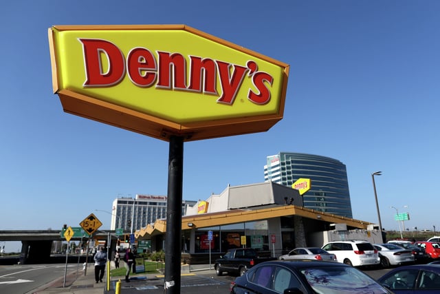The sign for a Denny’s restaurant is seen on Feb. 13, 2023, in Emeryville, Calif.