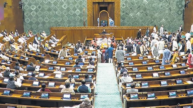 Opposition MPs raise slogans against the JPC report regarding the Waqf Amendment Bill in Lok Sabha during the Budget Session of Parliament on Thursday. (Sansad TV)