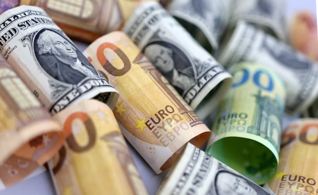 U.S. Dollar and Euro banknotes are seen in this illustration taken July 17, 2022. REUTERS/Dado Ruvic/Illustration/File Photo