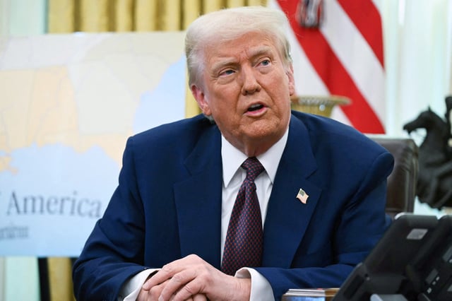 President Donald Trump in the Oval Office of the White House as he announces reciprocal tariffs, on Feb. 13, 2025.