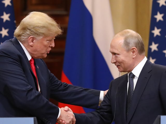 FILE: Bloomberg Best Of U.S. President Donald Trump 2017 - 2020: U.S. President Donald Trump, left, shakes hands with Vladimir Putin, Russia's President, during a news conference in Helsinki, Finland, on Monday, July 16, 2018. Our editors select the best archive images looking back at Trump’s 4 year term from 2017 - 2020. Photographer: Chris Ratcliffe/Bloomberg