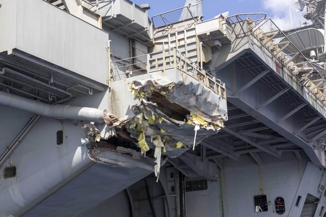 MEDITERRANEAN SEA (Feb. 13, 2025) Exterior damage of USS Harry S. Truman (CVN 75) viewed from a ship’s rigid-hull inflatable boat following a collision with merchant vessel Besiktas-M, Feb. 12, while operating in the vicinity of Port Said, Egypt. USS Harry S. Truman, the flagship of the Harry S. Truman Carrier Strike Group (HSTCSG), is on a scheduled deployment in the U.S. 6th Fleet area of operations supporting U.S. Naval Forces Europe-Africa to defend U.S., Allied and partner interests. (U.S. Navy photo by Mass Communication Specialist 1st Class Cody Beam)