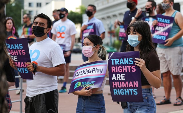 Protesters during the #ProtectTransKids rally outside Orlando City Hall in June 2021.  