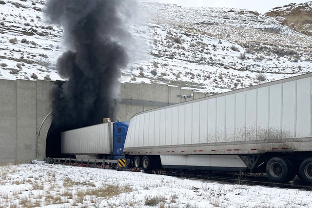 Smoke exits a tunnel after a multi vehicle crash along I 80 at milepost 90.2 inside the WB tunnel, in Green River, Wyoming, on Friday.